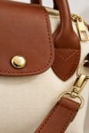 krem-taba-cift-renkli-fermuarli-capraz-minimalist-mini-el-ve-omuz-cantasi-979069621-0